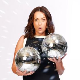 Australian comedian, Celeste Barber, poses holding two disco balls to promote her show 'Backup Dancer'. 
