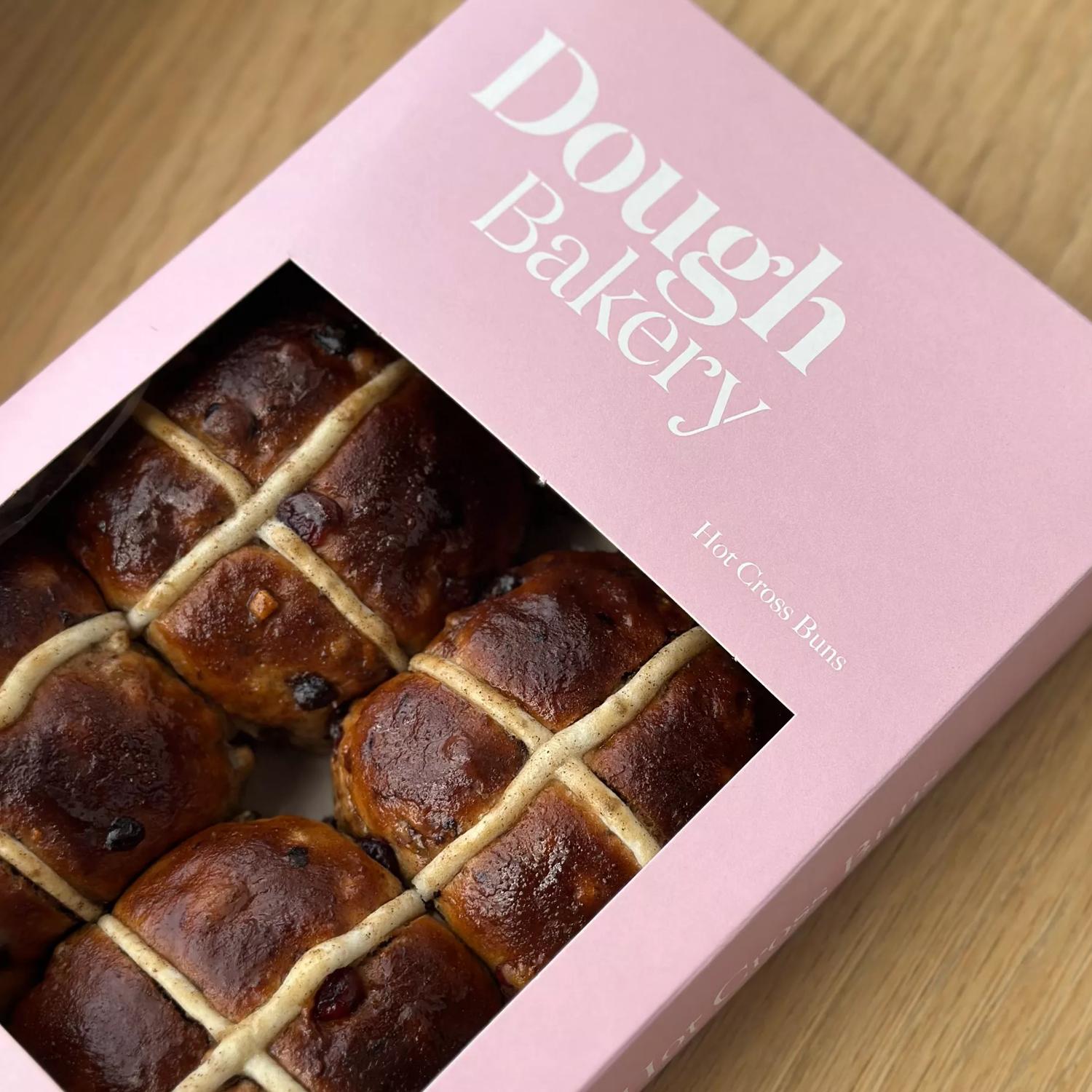 A box of hot cross buns from Dough Bakery, a bakery in Te Aro, Wellington. 