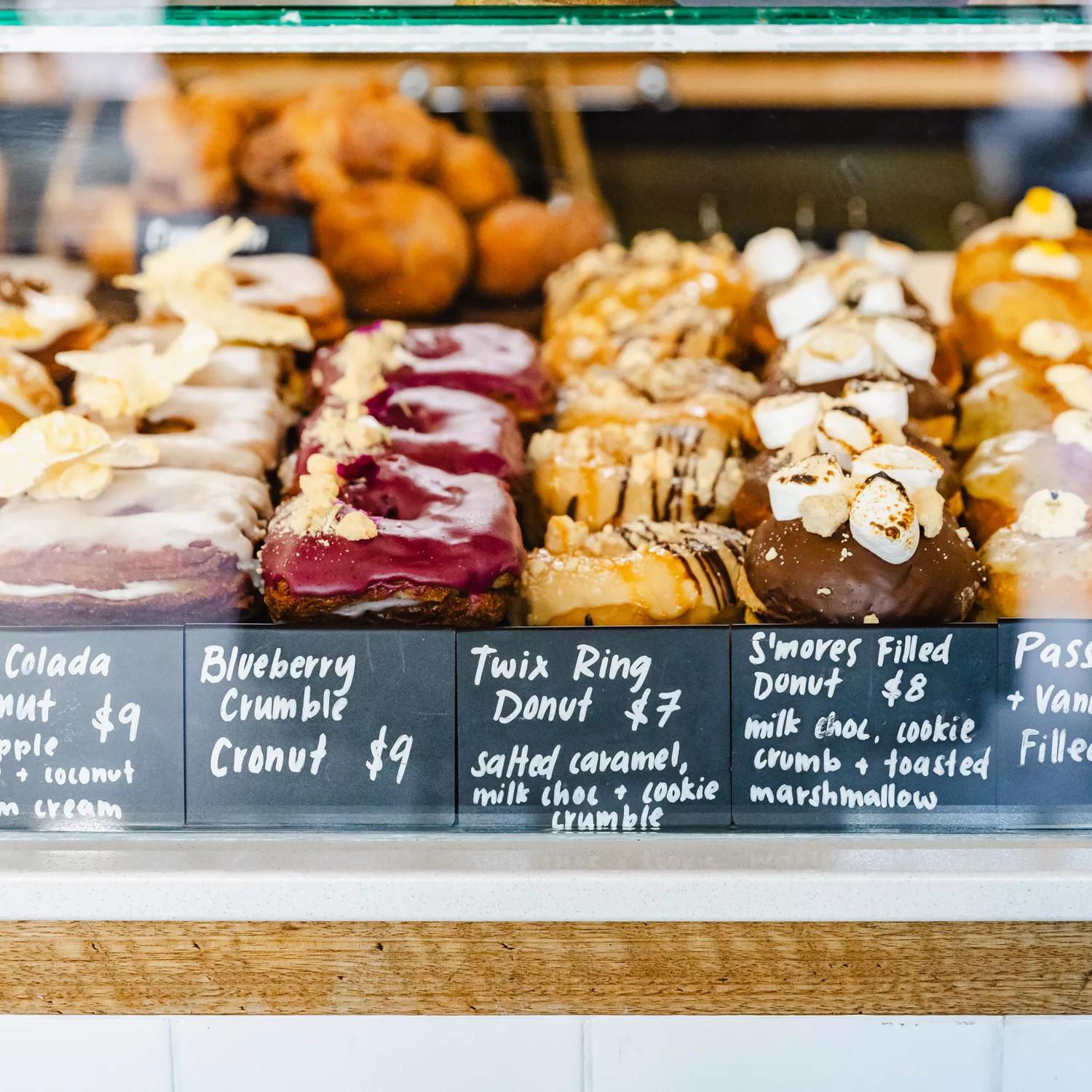 A variety of gourmet, vegan doughnuts available at Belèn Vegan Bakery in Wellington, New Zealand.