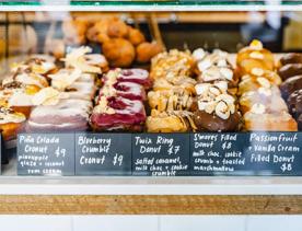 A variety of gourmet, vegan doughnuts available at Belèn Vegan Bakery in Wellington, New Zealand.