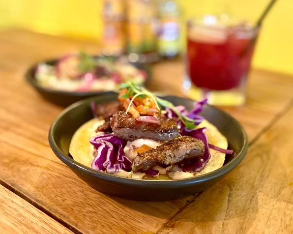 A steak taco dish served at Hola Mexican.