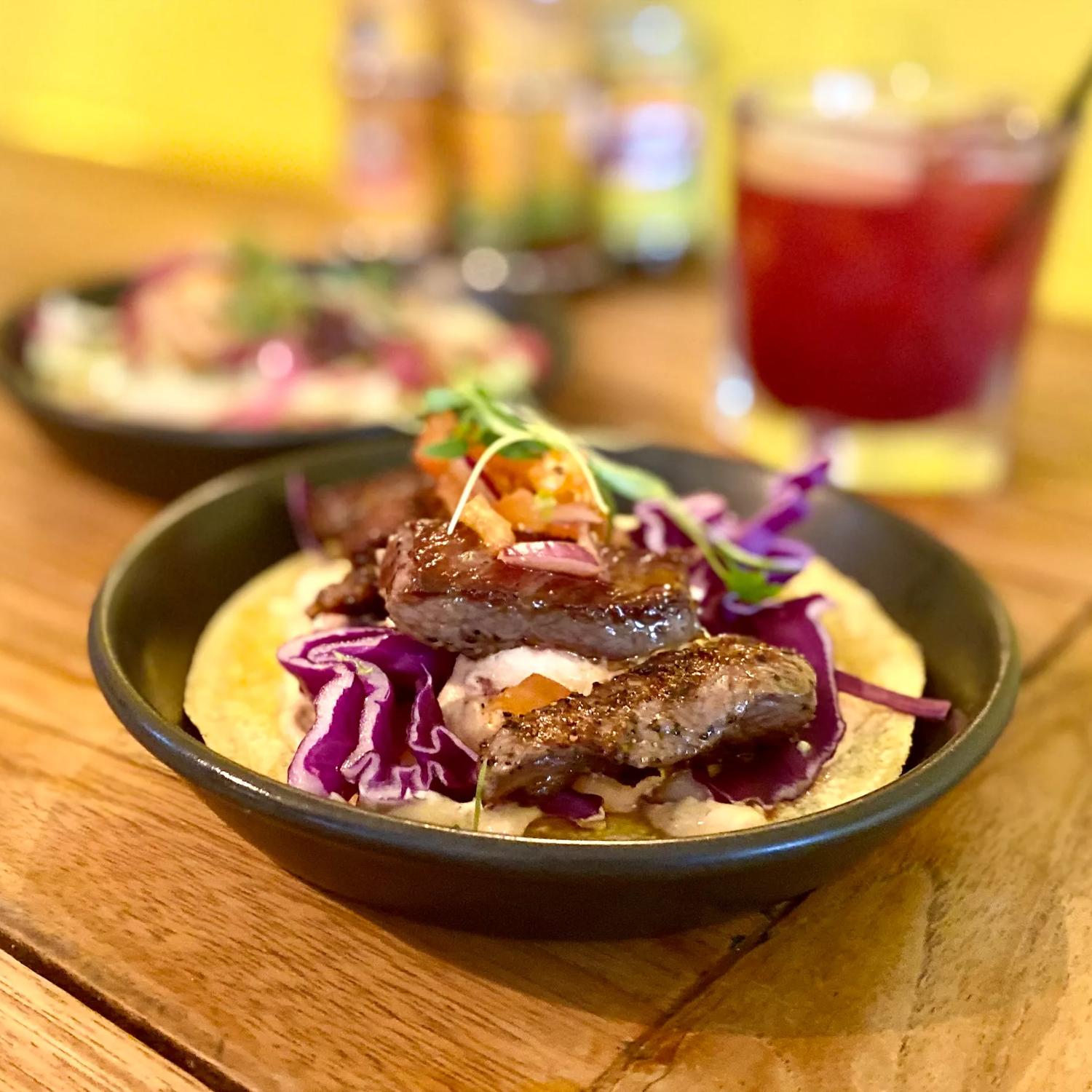 A steak taco dish served at Hola Mexican.