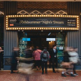 People walk past the St James Theatre on Courtenay Place.