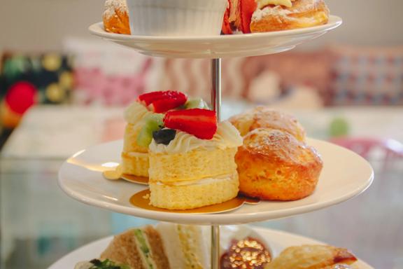 A cake stand holds finger food for high tea at Marth’s Pantry.