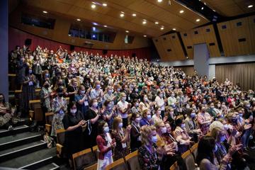 A standing ovation from a full audience of women wearing face masks at the New Zealand Women in Medicine Conference 2022 at Te Papa.