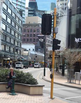 The mix of modern and old buildings along Lambton Quay, including the old supreme court, and old bank.