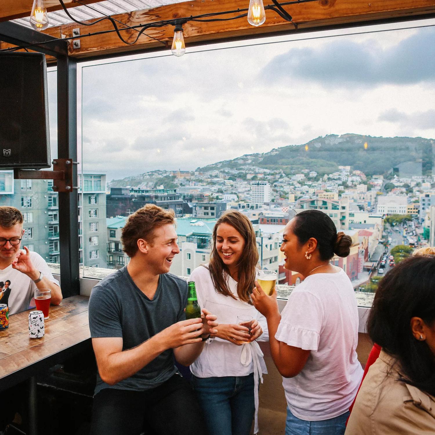 Customers enjoy a drink on the rooftop bar Dirty Little Secret.