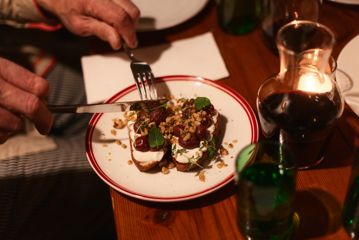 A person eating an authentic Italian dish at Cicio Cacio Osteria in Newtown, Wellington