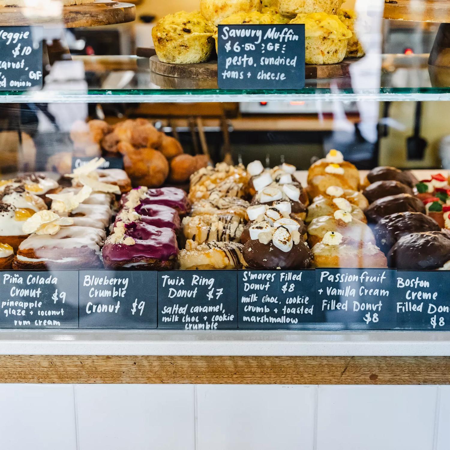 Doughnuts in the pastry window at Belén Vegan Bakery located at 104 Lambton Quay in Wellington Central.