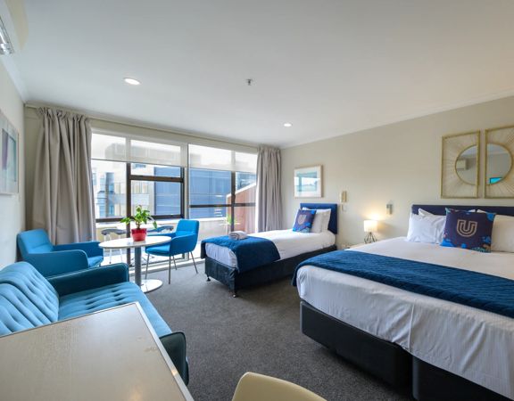 Two beds in a room at U Residence Hotel Wellington