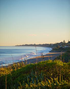 Queen Elizabeth Regional Park, looking over the beach at sunset.