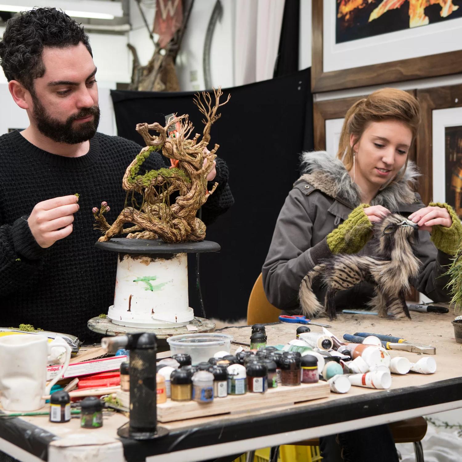 Two people are doing a prop-making activity at Wētā Workshop in Miramar, Wellington.