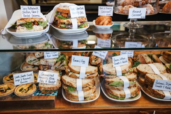 The glass display at Myrtle, a bakery located in Mount Victoria in Wellington, filled with various sandwiches, quiche and croissants. 