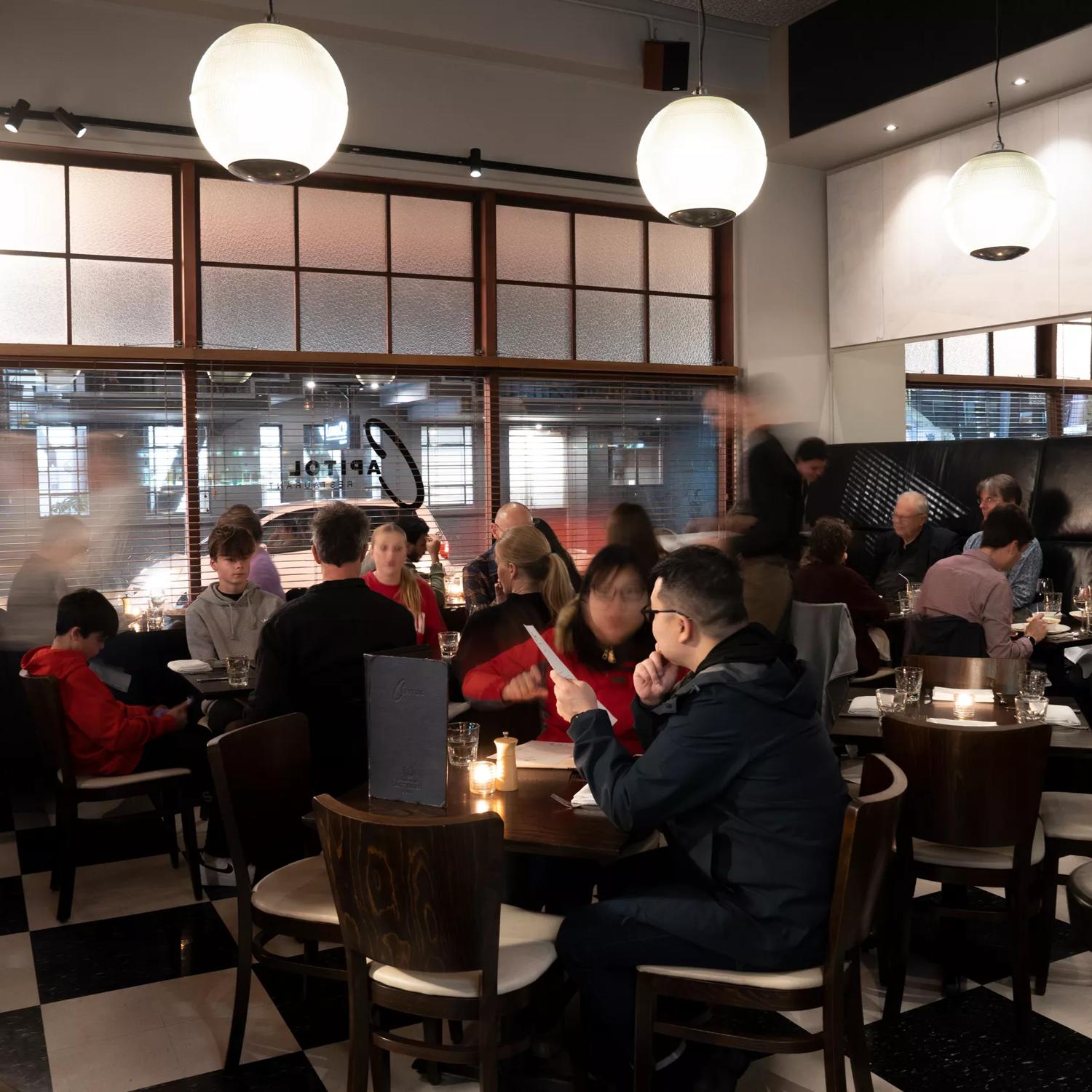 Interior shot of busy restaurant atmosphere.