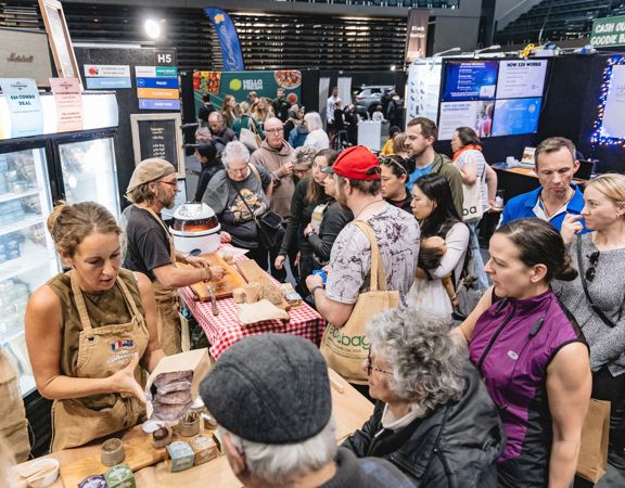 A photograph of people shopping at the Go Green Expo at TSB Arena in Wellington