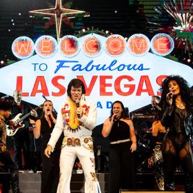 The Las Vegas tribute show, Legends in Concert, performing on stage as Elvis and Cher.