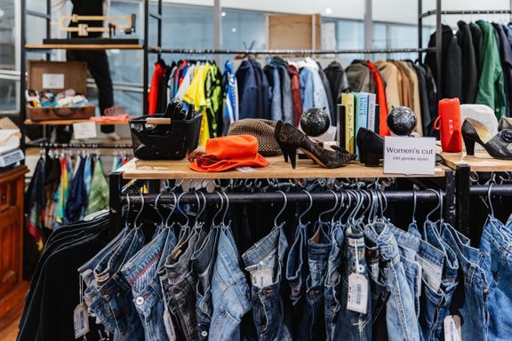 Clothing racks inside Frip Vintage.