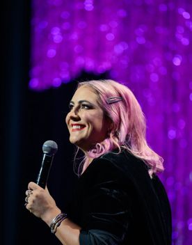 Comedian Hayley Sproull performs stand-up comedy.