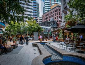 The water fountain and bench seating in the pedestrian section on Grey Street at Lambton Quay in Wellington Central. 