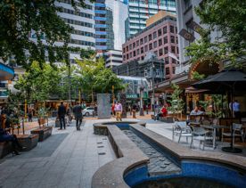 The water fountain and bench seating in the pedestrian section on Grey Street at Lambton Quay in Wellington Central.