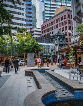 The water fountain and bench seating in the pedestrian section on Grey Street at Lambton Quay in Wellington Central.
