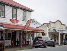 The screen location of Greytown, a historic small town featuring Victorian buildings,  stables, colonial cottages, and rural landscapes surrounding.