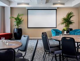 A conference room setup at Rydges Wellington, a four and a half star hotel located in Pipitea, Wellington.