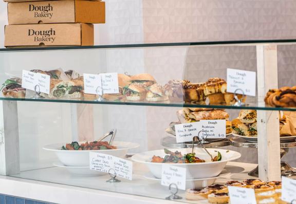 The display window at Dough Bakery Lombard Lane in Te ARo, Wellington, is filled with fresh baked goods for sale. 