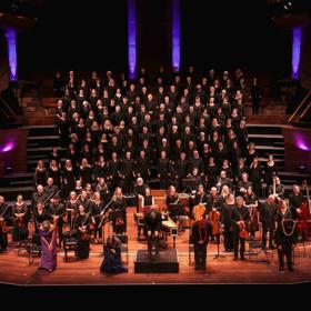 The Orpheus Choir and orchestral ensemble perform at the Michael Fowler Centre.