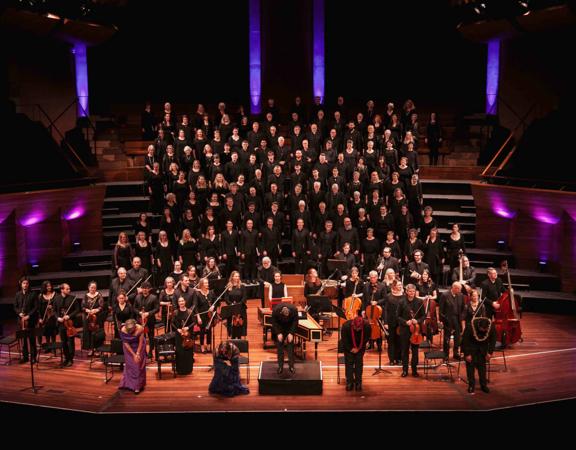 The Orpheus Choir and orchestral ensemble perform at the Michael Fowler Centre.