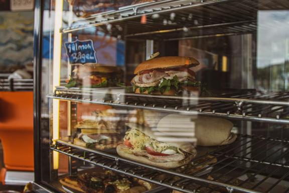 Sandwiches inside of a glass cabinet at The Big Salami cafe in Porirua.