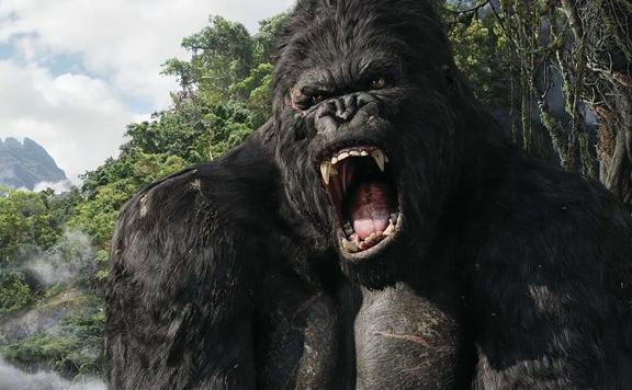 A still from the movie ‘King Kong’. The giant black gorilla opens its mouth in a roar.
