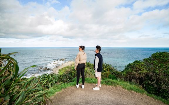 Two hikers stop to admire the view from the Eastern Walkway.