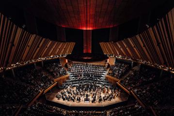 The Orchestra Wellington performing at the Michael Fowler Centre to a full audience.