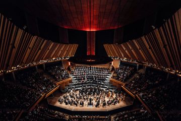 The Orchestra Wellington performing at the Michael Fowler Centre to a full audience.