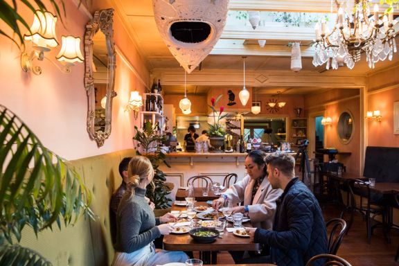 Four friends enjoy dinner and drinks at Havana Bar and Restaurant in Wellington.