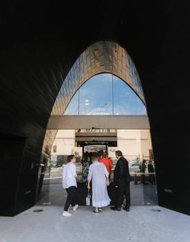 The screen location of Tākina, the large convention centre with unique designs and large open industrial feeling spaces.