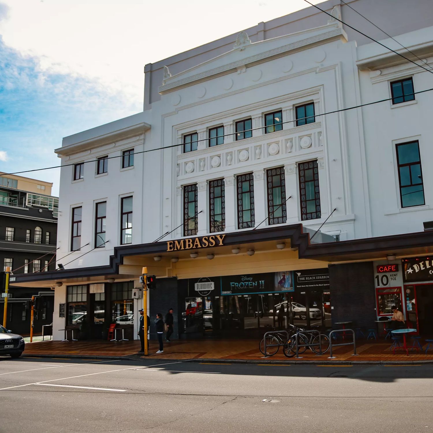 Exterior of the Embassy Theatre cinema with Deluxe cafe at the base of the building.