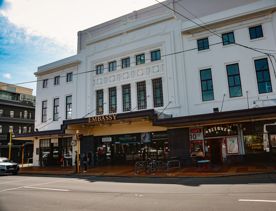 Exterior of the Embassy Theatre cinema with Deluxe cafe at the base of the building.