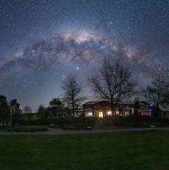 Luna Estate at night with the milkyway visible in the sky above