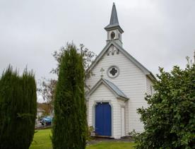 The screen location of Greytown, a historic small town featuring Victorian buildings,  stables, colonial cottages, and rural landscapes surrounding.