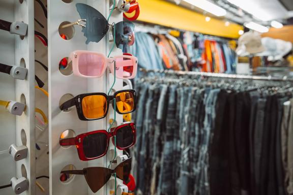 A rack of funky sunglasses inside Spacesuit, a second-hand clothing store located on Cuba Street in Te Aro, Wellington.