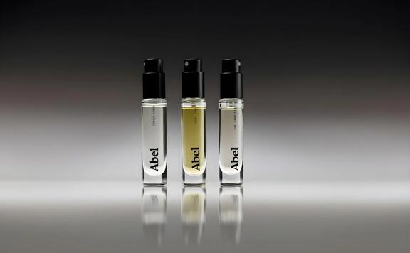 Three of Abel's perfume mini fragrances lined up