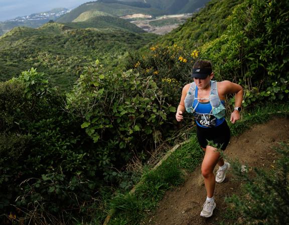 A runner participates in Faultline Ultra on a trail in Wellington.