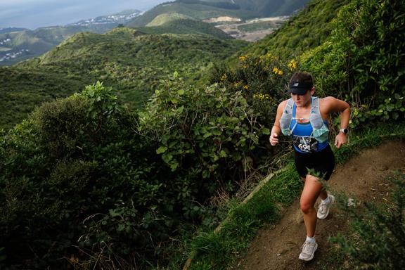 A runner participates in Faultline Ultra on a trail in Wellington.