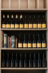 A cabinet full of dark wines at The Runholder.