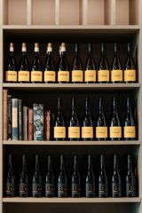 A cabinet full of dark wines at The Runholder.