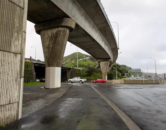 The urban setting of the Hutt Road Ngauranga Interchange, where highways got over tunnels with walls that once had graffiti.