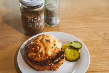 Pickle & Pie's cheese scone with pickles on the side.