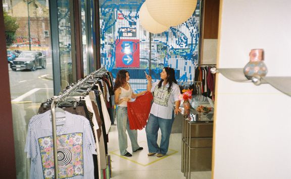 Two people shopping at Sully's fashion boutique in Wellington.